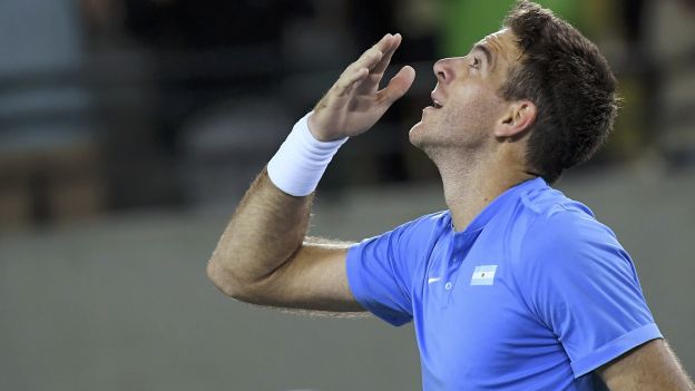 2016 Rio Olympics - Tennis - Preliminary - Men's Singles First Round - Olympic Tennis Centre - Rio de Janeiro, Brazil - 07/08/2016. Juan Martin Del Potro (ARG) of Argentina celebrates after winning his match against Novak Djokovic (SRB) of Serbia. REUTERS/Toby Melville FOR EDITORIAL USE ONLY. NOT FOR SALE FOR MARKETING OR ADVERTISING CAMPAIGNS.